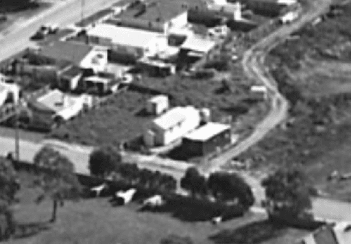 Aerial view of Wivenhoe, Tasmania Archives, 1970-1979 - Long white building in the centre